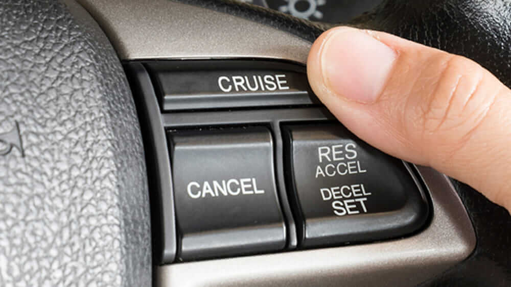 A man using his cruise control